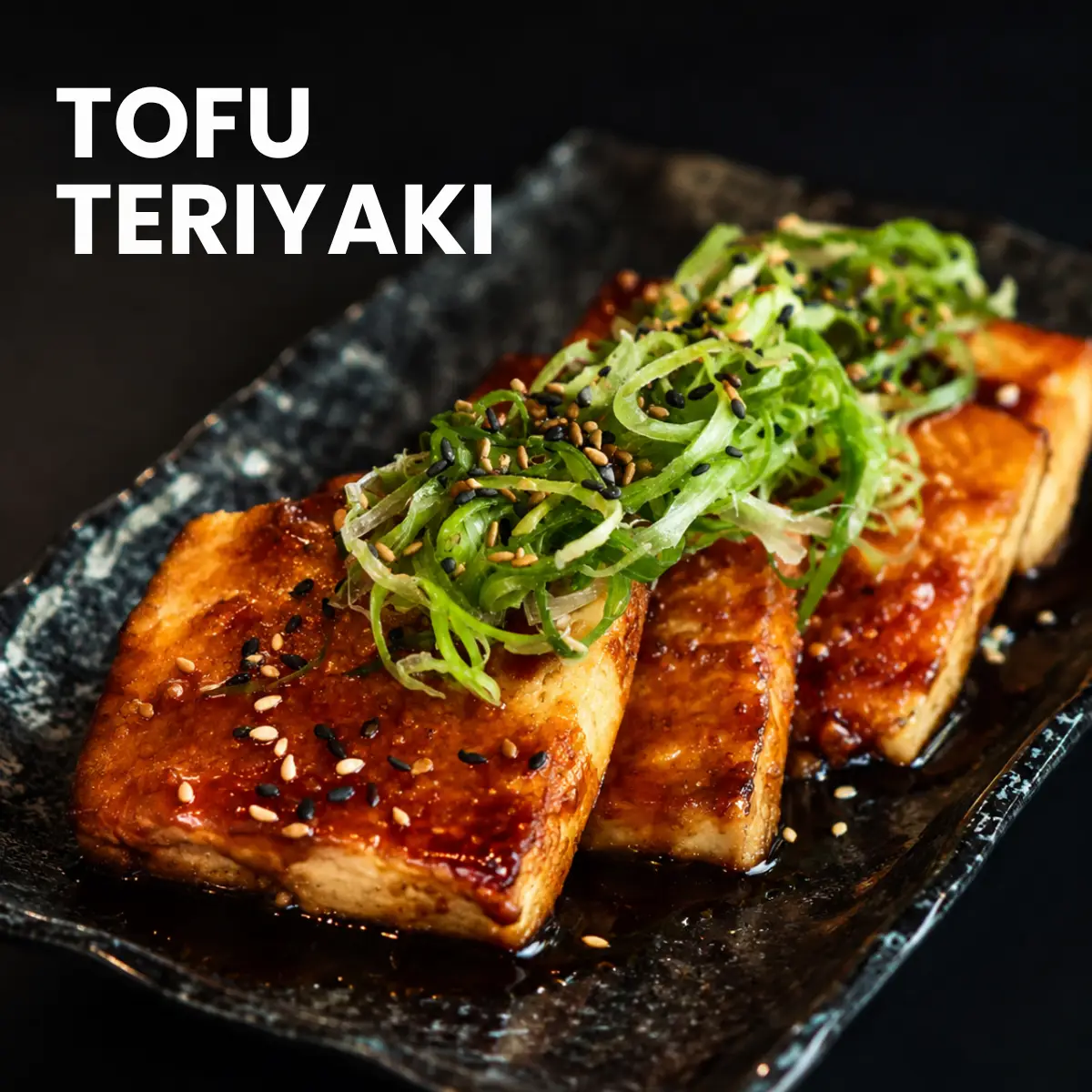 Crispy golden tofu coated in rich teriyaki, finished with green onions and sesame seeds.